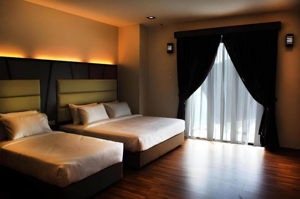 Hotel Grand Baron Taiping Extérieur photo